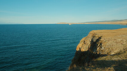 Golden Baikal and rocks