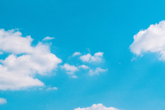 the Vastness of the Blue Sky and Fluffy Clouds