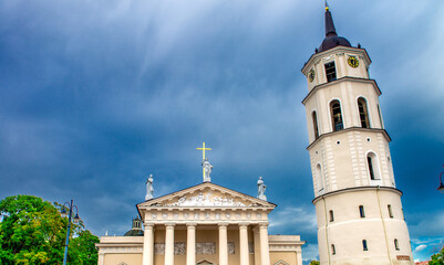 Bell Tower And Facade Of Cathedral Basilica Of St. Stanislaus And St. Vladislav On Cathedral Square in Vilnius, Lithuania.