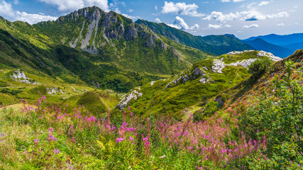 Naklejka na ściany i meble Carnic Mountains. Ponds, huts and breathtaking views.