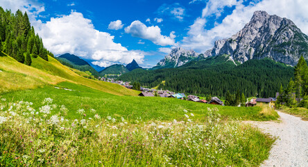 Summer among the paths, waterfalls and the villages of Sappada.