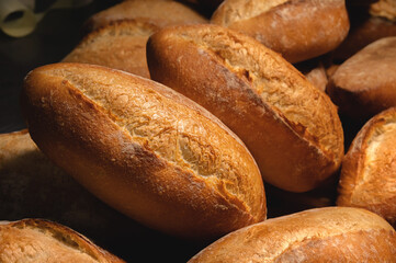 Lots of French bread rolls. Freshly baked French rolls are delicious. Close-up