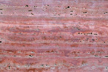 longitudinal cut of pink granite with splashes.