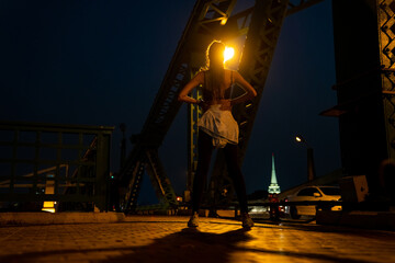 Confidence Hispanic woman in sportswear jogging on the bridge in the city at summer sunset. Healthy wellness female athlete enjoy outdoor lifestyle sport training workout fitness exercise and running