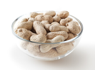 Raw peanuts in glass bowl isolated on white background with clipping path