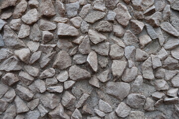 Backdrop - wall with light gray gravel pebble dash