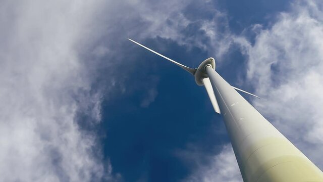 Windkraft Anlage mit Wolken und blauen Himmel im Hintergrund und Freiraum f&uuml;r eigenen Text