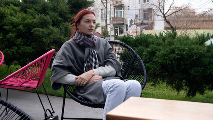 Outdoor lifestyle portrait of amazing glamorous luxury woman posing in city center. 