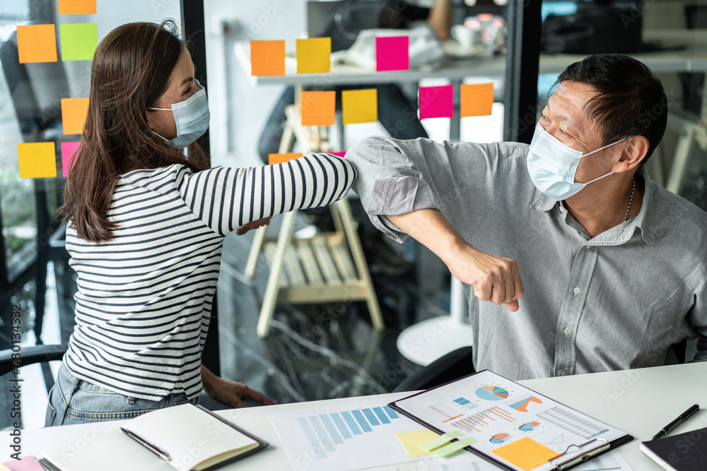 Poster business team is shaking with elbow bump in new normal concept to greeting when meeting to brainstor