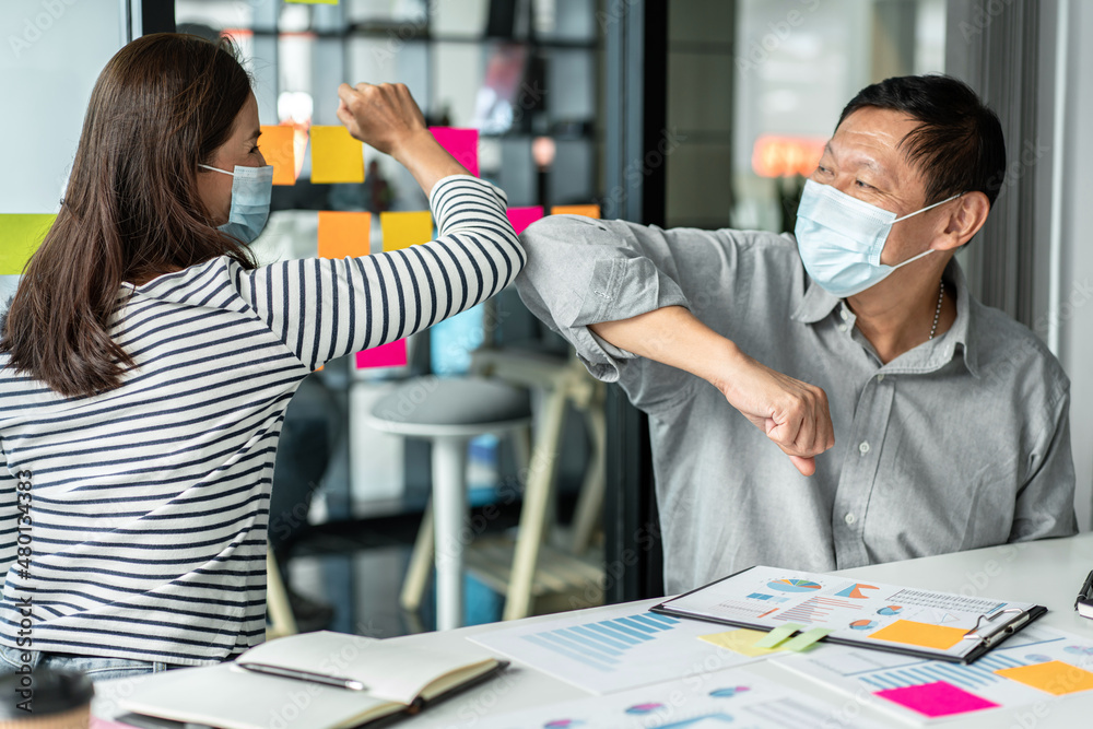 Poster business team is shaking with elbow bump in new normal concept to greeting when meeting to brainstor
