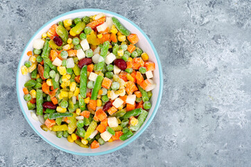 Mix of different frozen vegetables, healthy eating, vitamin preservation. Studio Photo