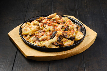 Slices of eggplant baked with champignon and cheese