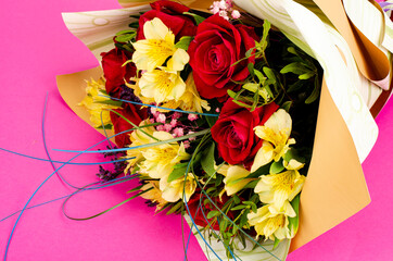 Luxurious beautiful bouquet of fresh flowers on bright background. Studio Photo
