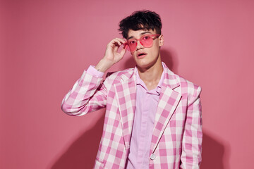 Obraz premium Photo of romantic young boyfriend self confidence pink plaid blazer fashion posing model studio