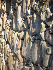 Background with a fragment of an old stone wall.