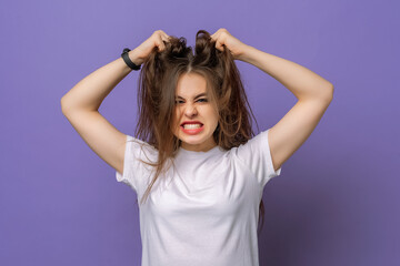 Woman is under huge mental pressure. Portrait of bothered devastated cute girl with long hair...