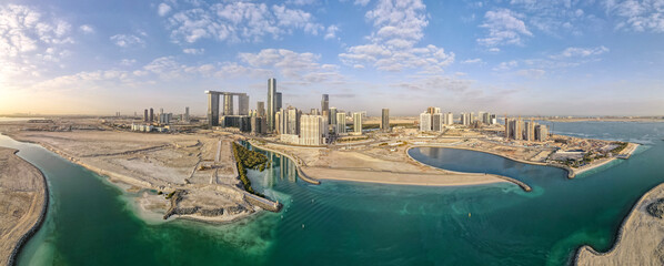 Aerial view on developing part of Al Reem island in Abu Dhabi on a cloudy day