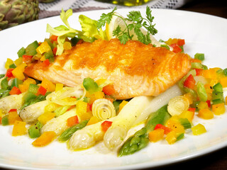 Salmon Fish Fillet with green and white Asparagus and Sauce Hollandaise
