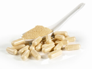 Maca Powder and Capsules on white Background - Isolated