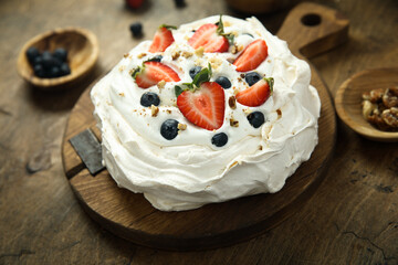 Pavlova meringue dessert with fresh berries