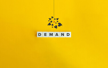 Demand Word and School of Fish Conceptual Image. Letter tiles on bright orange background.