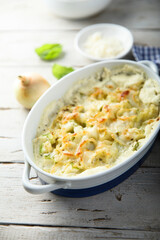 Homemade onion and cauliflower bake with cheese