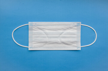 Medical mask isolated on background. Close-up of Coronavirus or COVID-19 protective face mask....