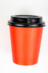 Red eco cardboard glass for drinks. Studio Photo.