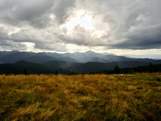 summer sunset at charphatian mountains with view on Chornogora