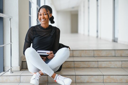 portrait of happy female african american college student
