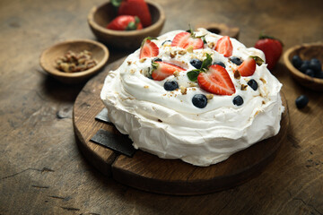 Pavlova meringue dessert with fresh berries