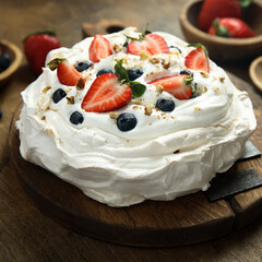 Pavlova meringue dessert with fresh berries