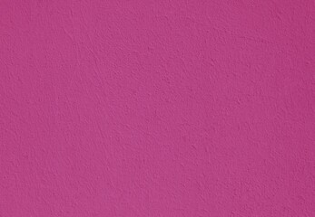Pink or hot purple wall, texture, background. The building wall, painted with water-based paint....