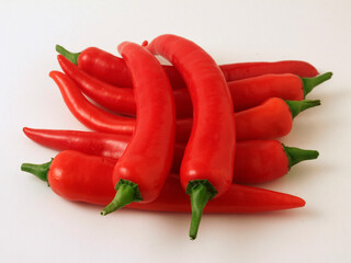 Isolated red hot chilli peppers.