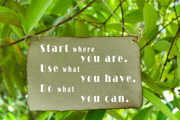 Inspirational and motivational quote on tree background