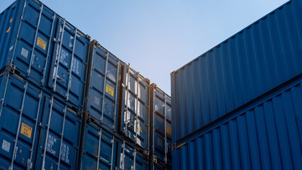 Obraz na płótnie Canvas Stack cargo containers box, Cargo freight ship for import export logistics service and transportation