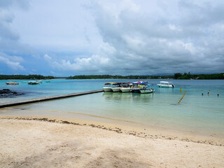 Motor boats at Grand Port, dangerous bathing in the bay, ile Chat, Mauritius, Africa