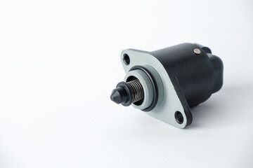 Auto parts . Car injector engine idler . close up on white background. idle air control valve