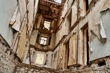 The interior of an abandoned crumbling building. A dying city. Frightening atmosphere