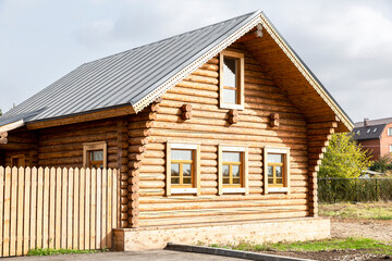 Obraz premium Traditional Russian wooden house from wood logs