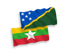 Flags of Solomon Islands and Myanmar on a white background