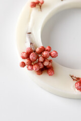 Aroma sachet with dried flowers with coconut or organic soy wax. Close up on white background