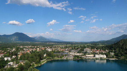 Fototapeta na wymiar Panoramic view to the Bled town and lake during a sunny day