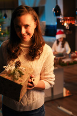 Happy mom and her daughter waiting for Christmas