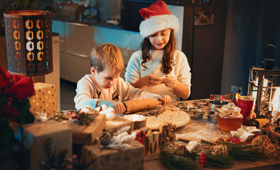 Happy beautiful family, mother and son preparing for Christmas together at home