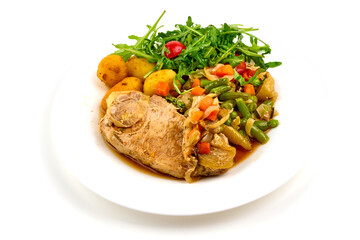 Stewed meat with vegetables and baked potatoes, hotpot, isolated on white background.