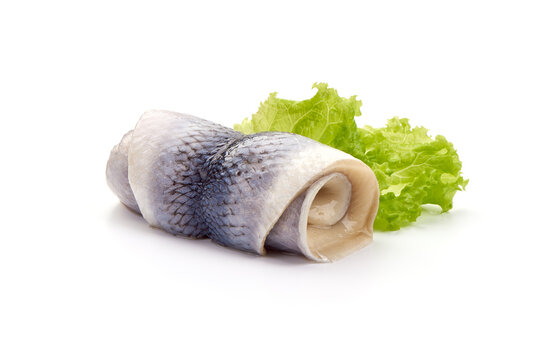 Salted herring rollmops, isolated on white background.