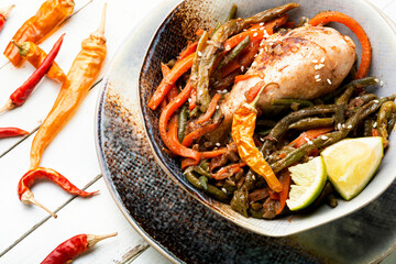 Chicken legs stewed with spices and vegetables.