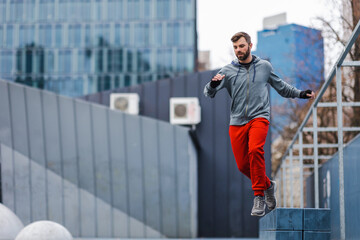 Man practicing parkour in the city
