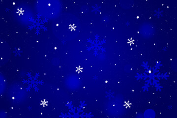 Obraz na płótnie Canvas Blue winter background with snowflakes.